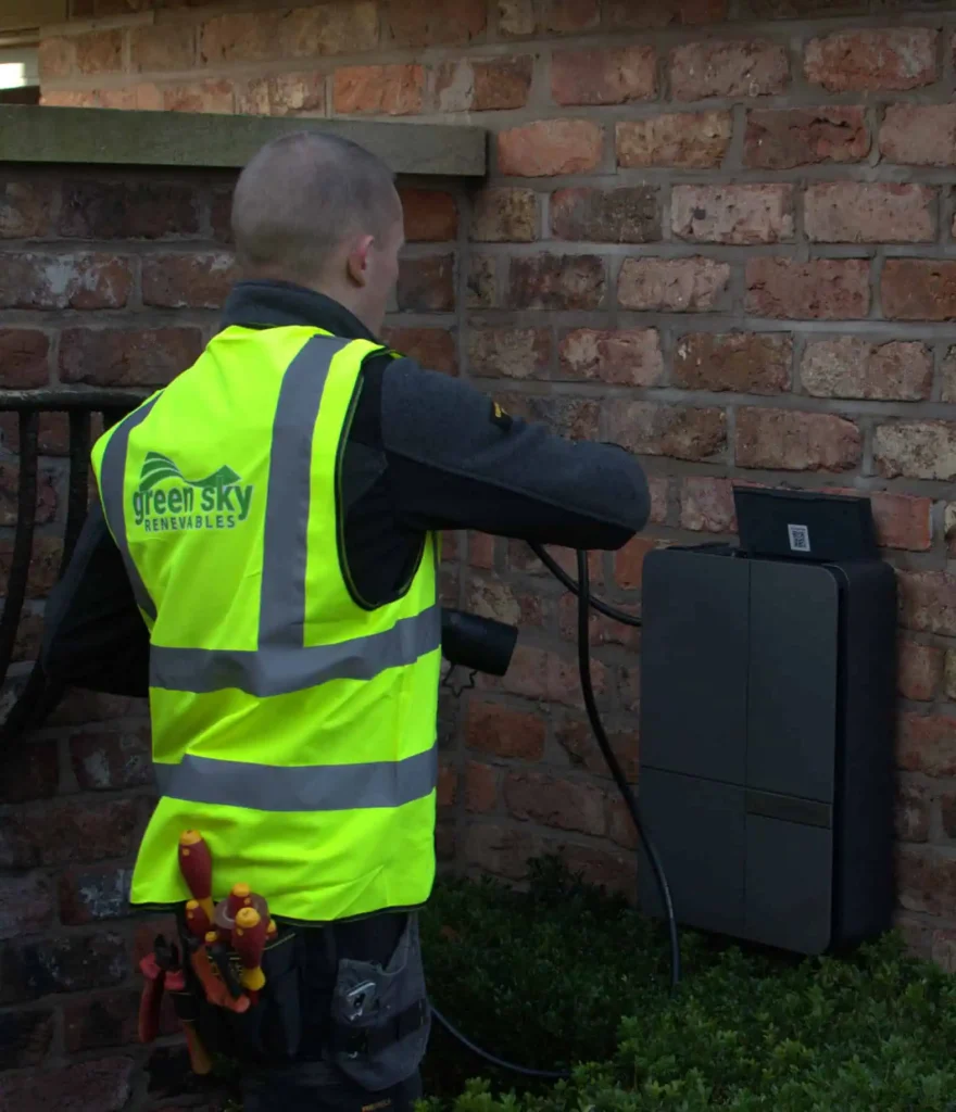 Green Sky Renewables technician installing solar battery system