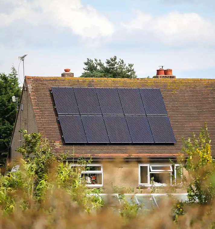 Solar panels installed on the roof of a family home